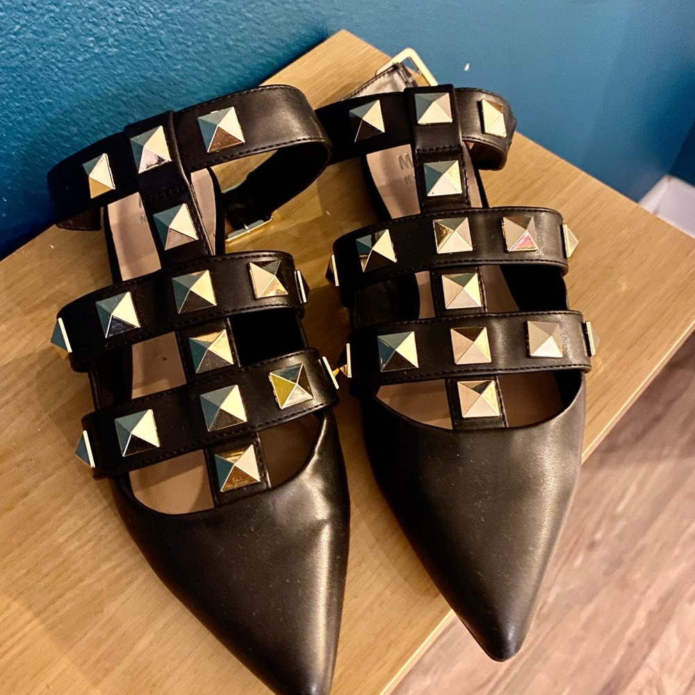 Black Leather Gold hardware shoes.